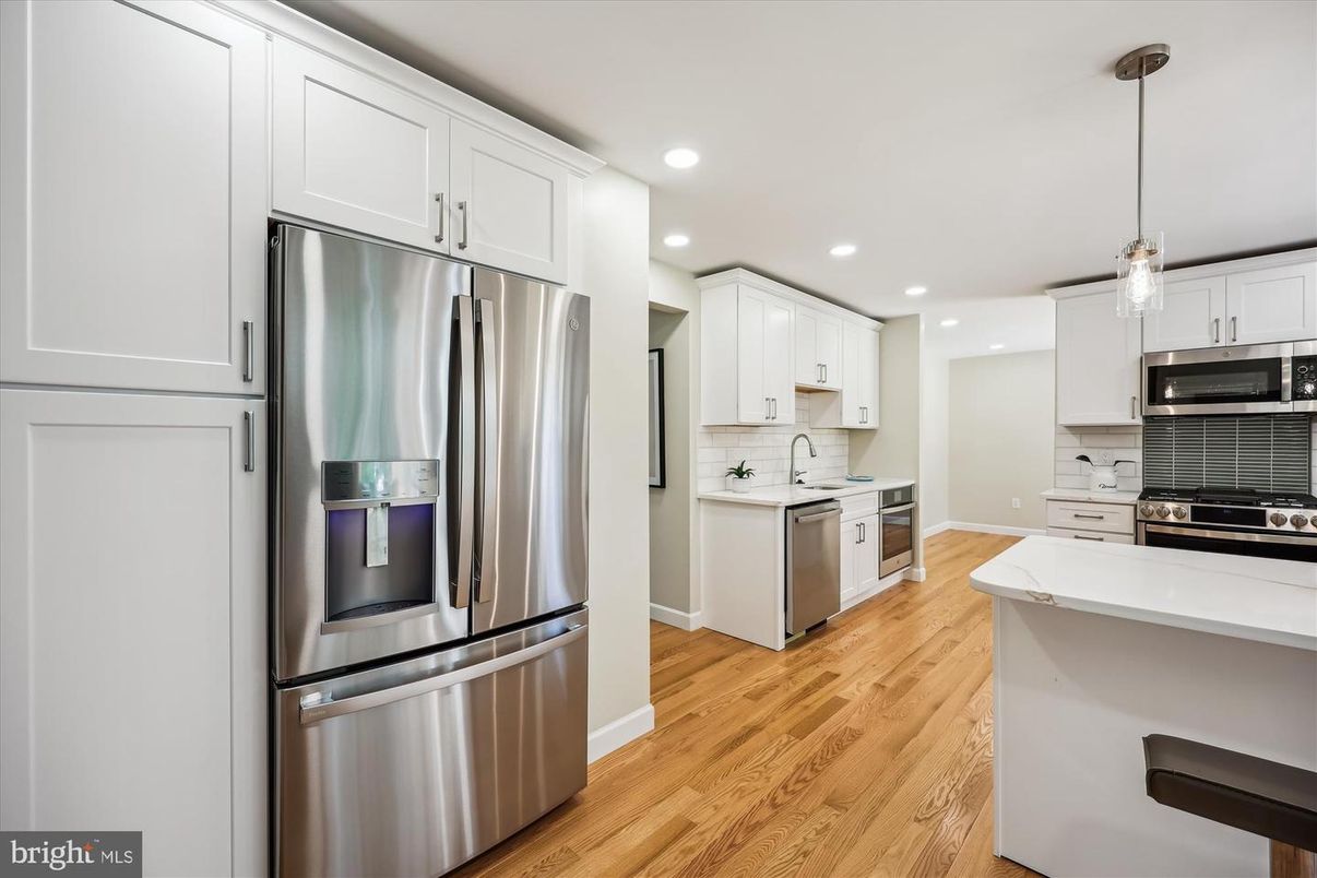 Interior, Kitchen, Pendant Lights, Recessed Lighting, Stainless Steel Appliances, Wood Texture Flooring