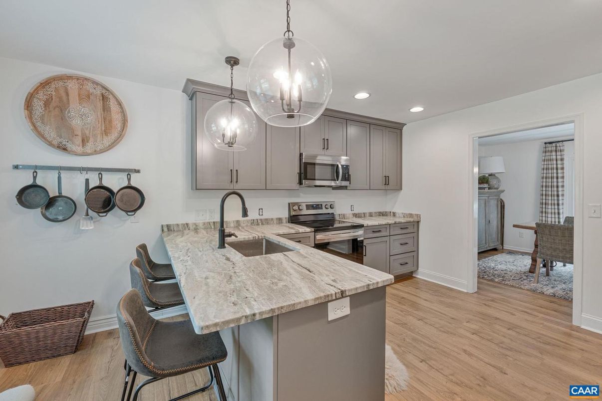 Interior, Kitchen, Pendant Lights, Recessed Lighting, Stainless Steel Appliances, Wood Texture Flooring
