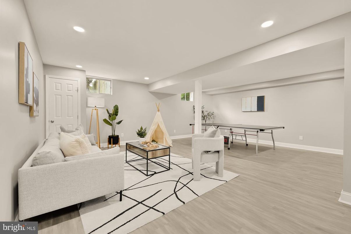 Fireplace, Game Room, Interior, Living room, Recessed Lighting, Wood Texture Flooring