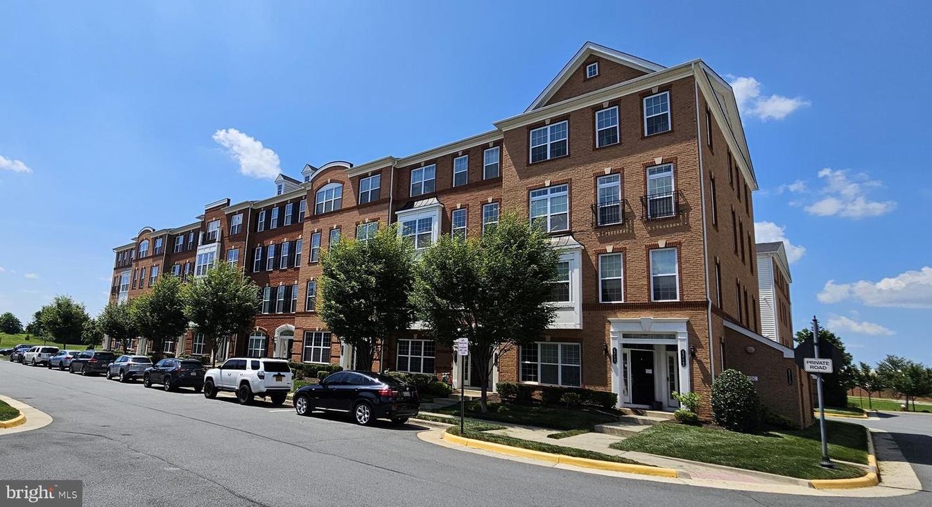 Exterior, Facade, Brick Facade, Condo Building