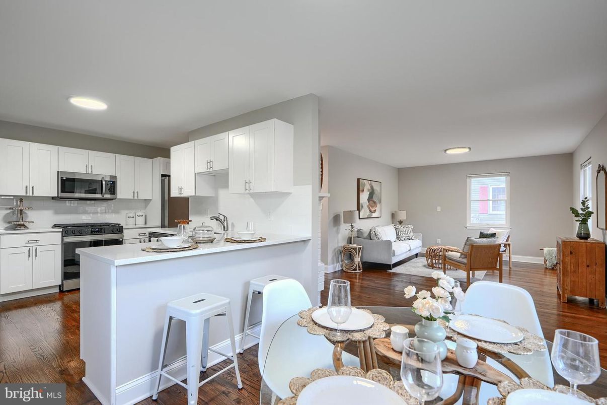 Dining room, Interior, Kitchen, Living room, Recessed Lighting, Stainless Steel Appliances, Wood Texture Flooring