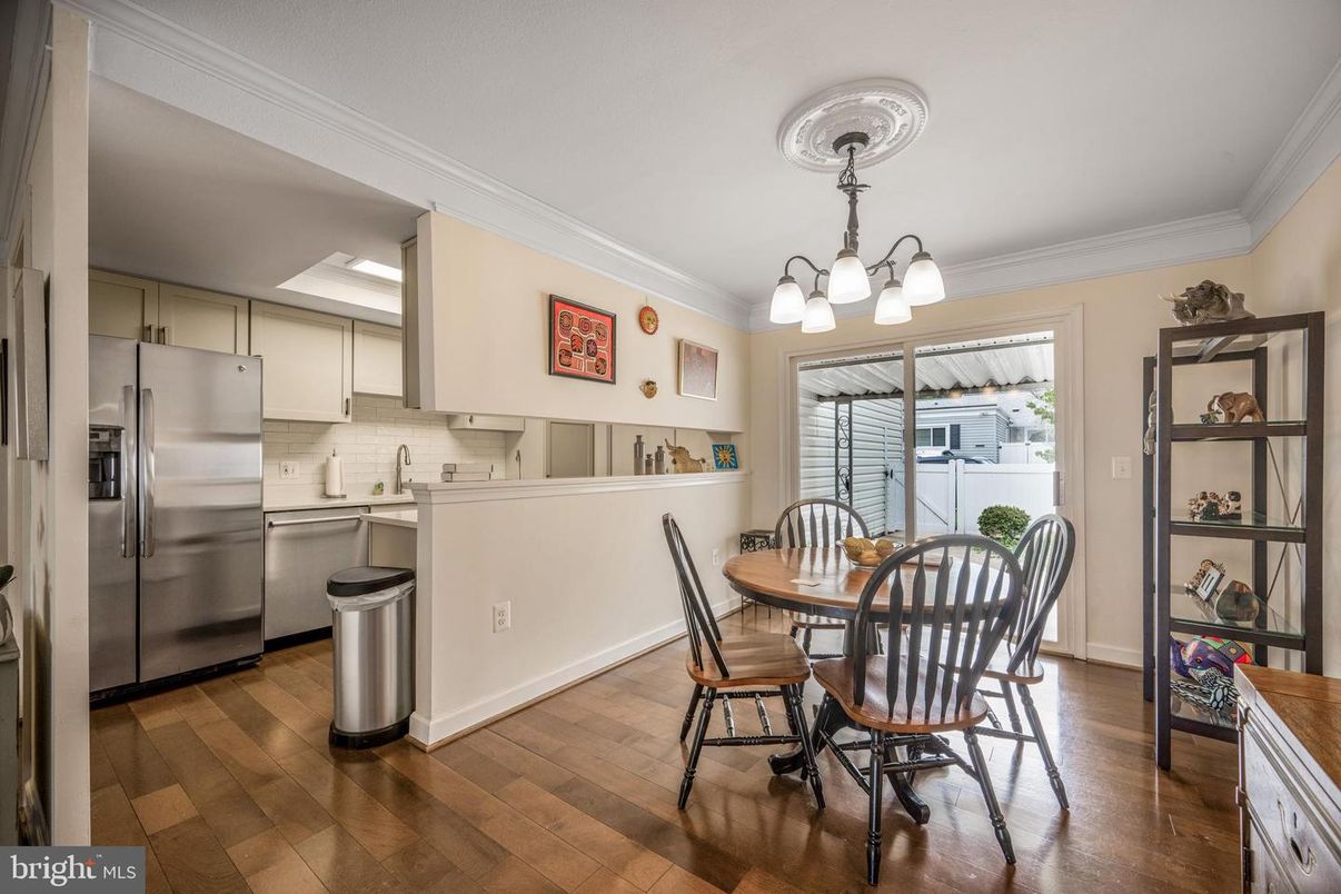 Chandelier, Dining room, Interior, Kitchen, Stainless Steel Appliances, Wood Texture Flooring