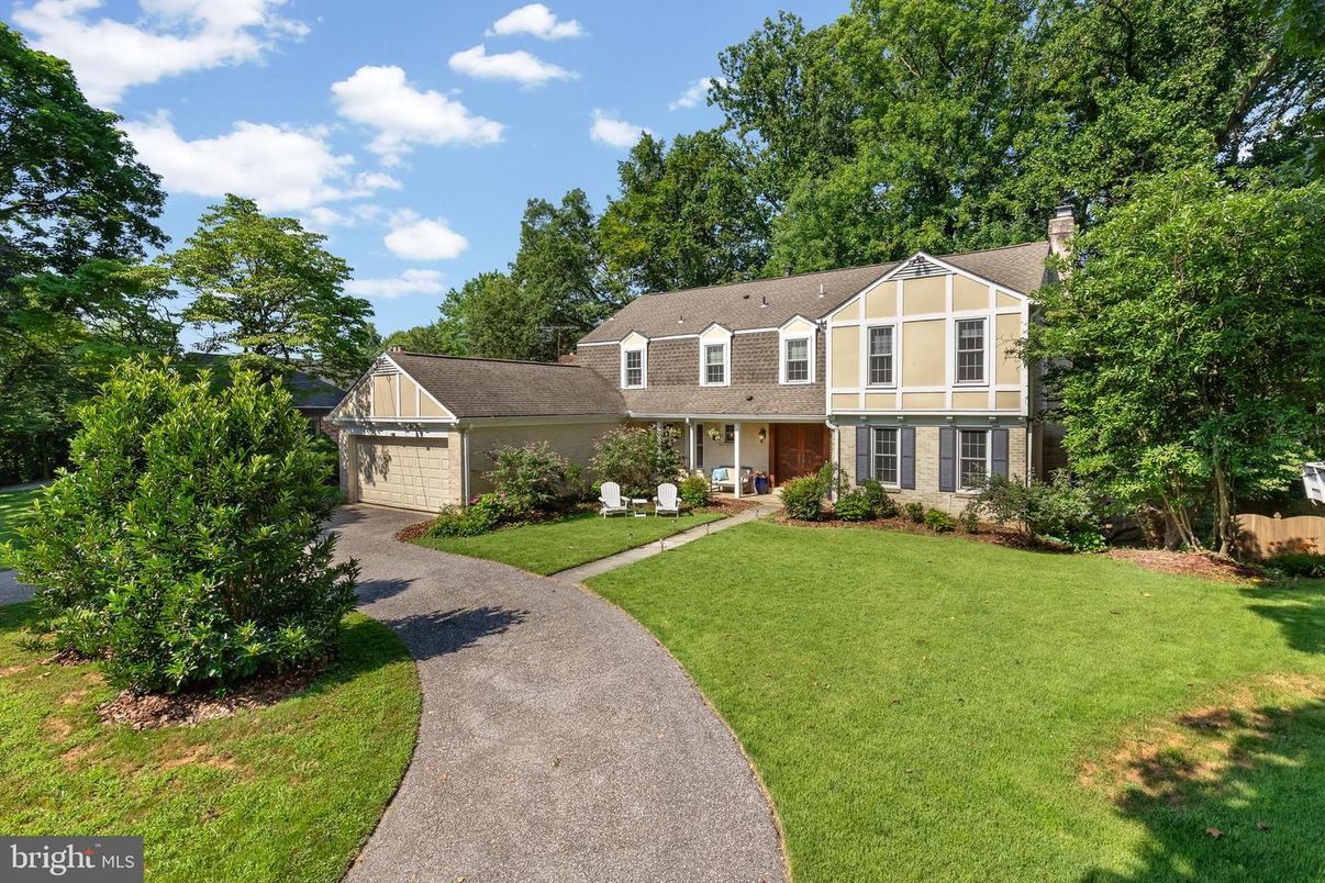 Attached, Backyard, Exterior, Facade, Brick Facade, Tudor Revival