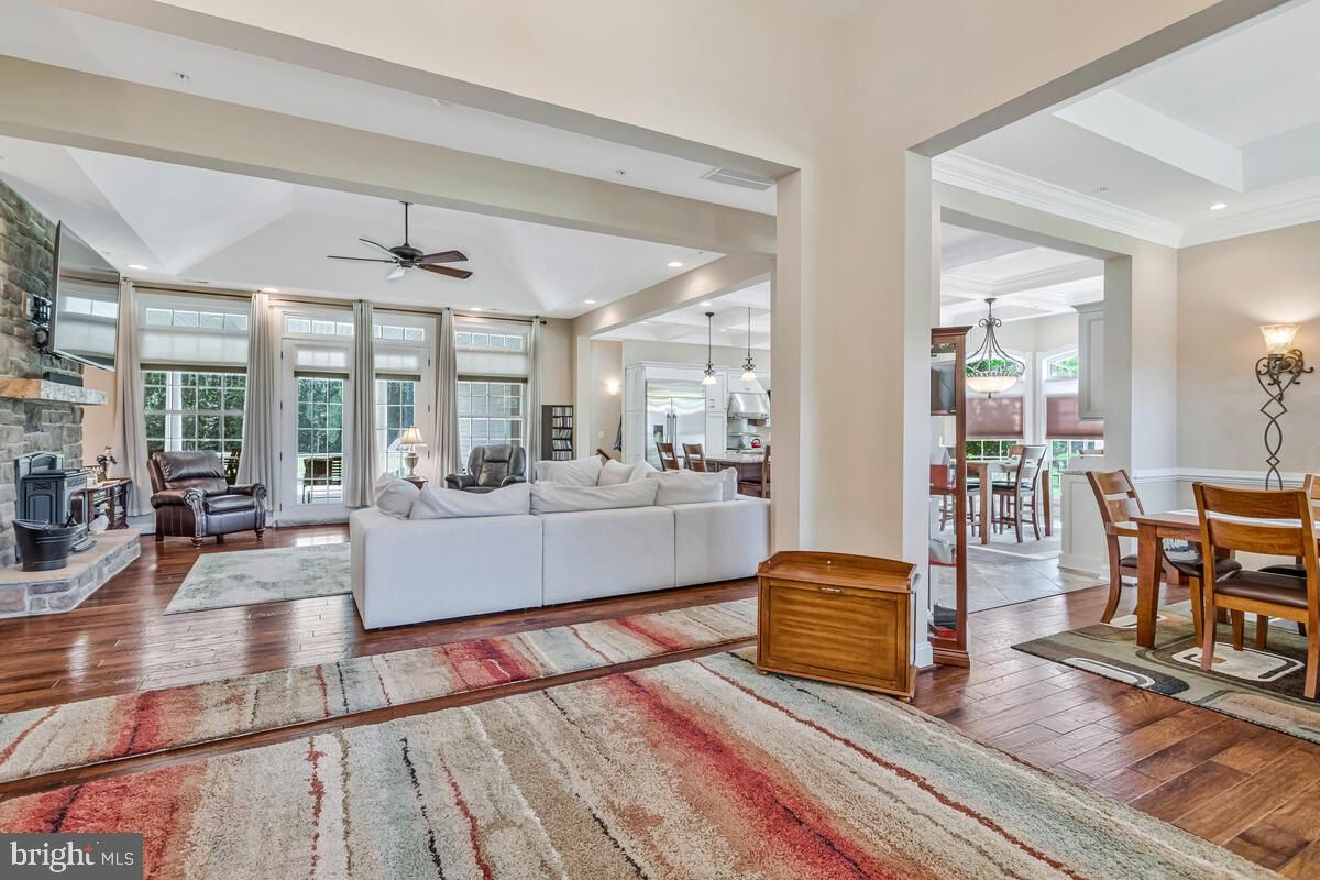 Dining room, Fireplace, Interior, Living room, Recessed Lighting, Wood Texture Flooring
