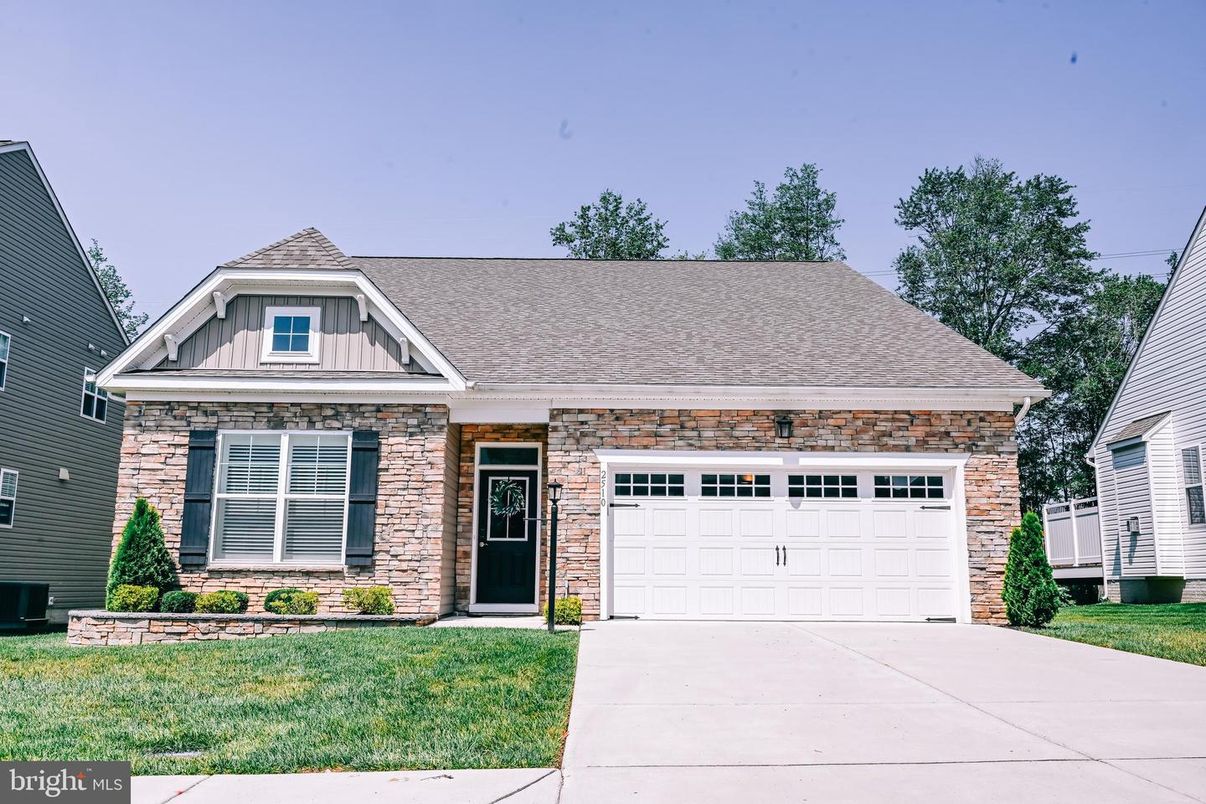 Attached, Exterior, Facade, Brick Facade, Cape Cod