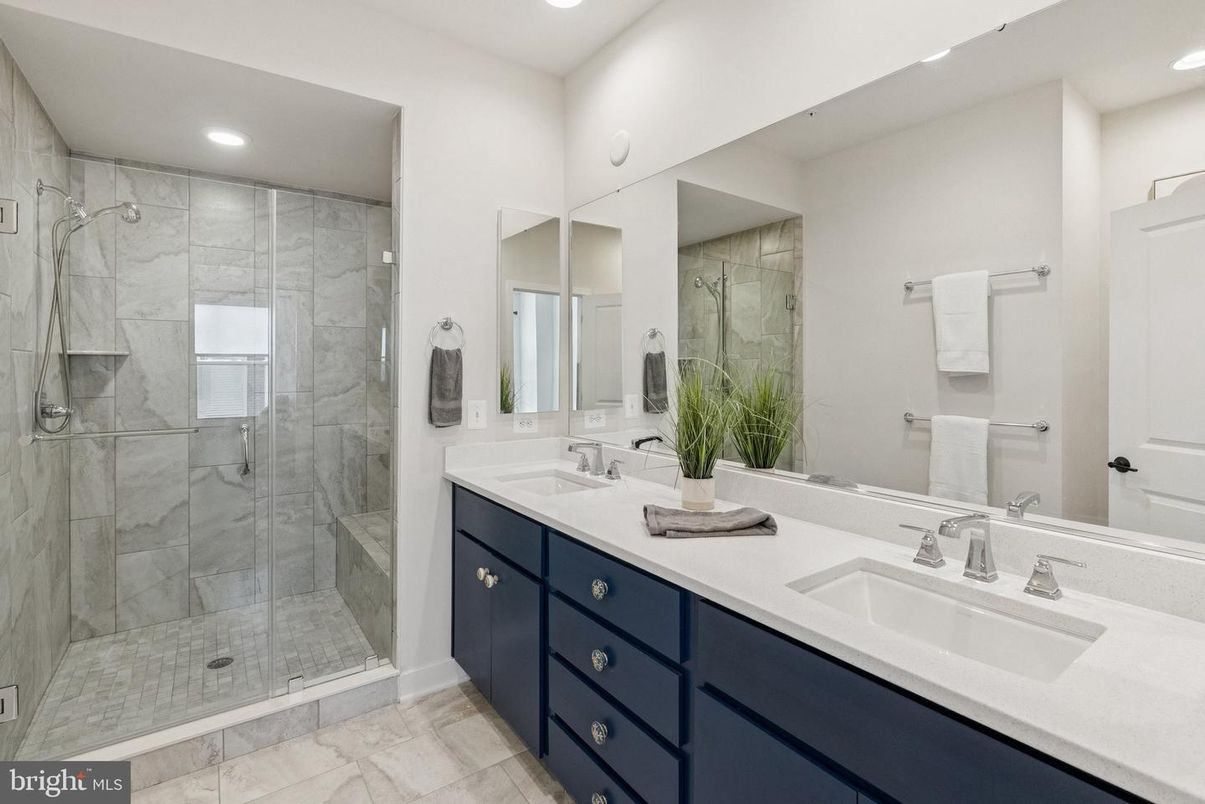 Bathroom, Dual Sink Vanities, Glass Shower, Interior, Marble Walls, Recessed Lighting