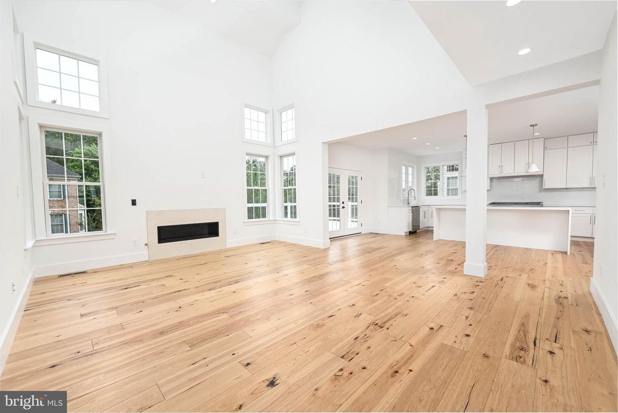 Empty room, Fireplace, Interior, Kitchen, Pendant Lights, Recessed Lighting, Wood Texture Flooring