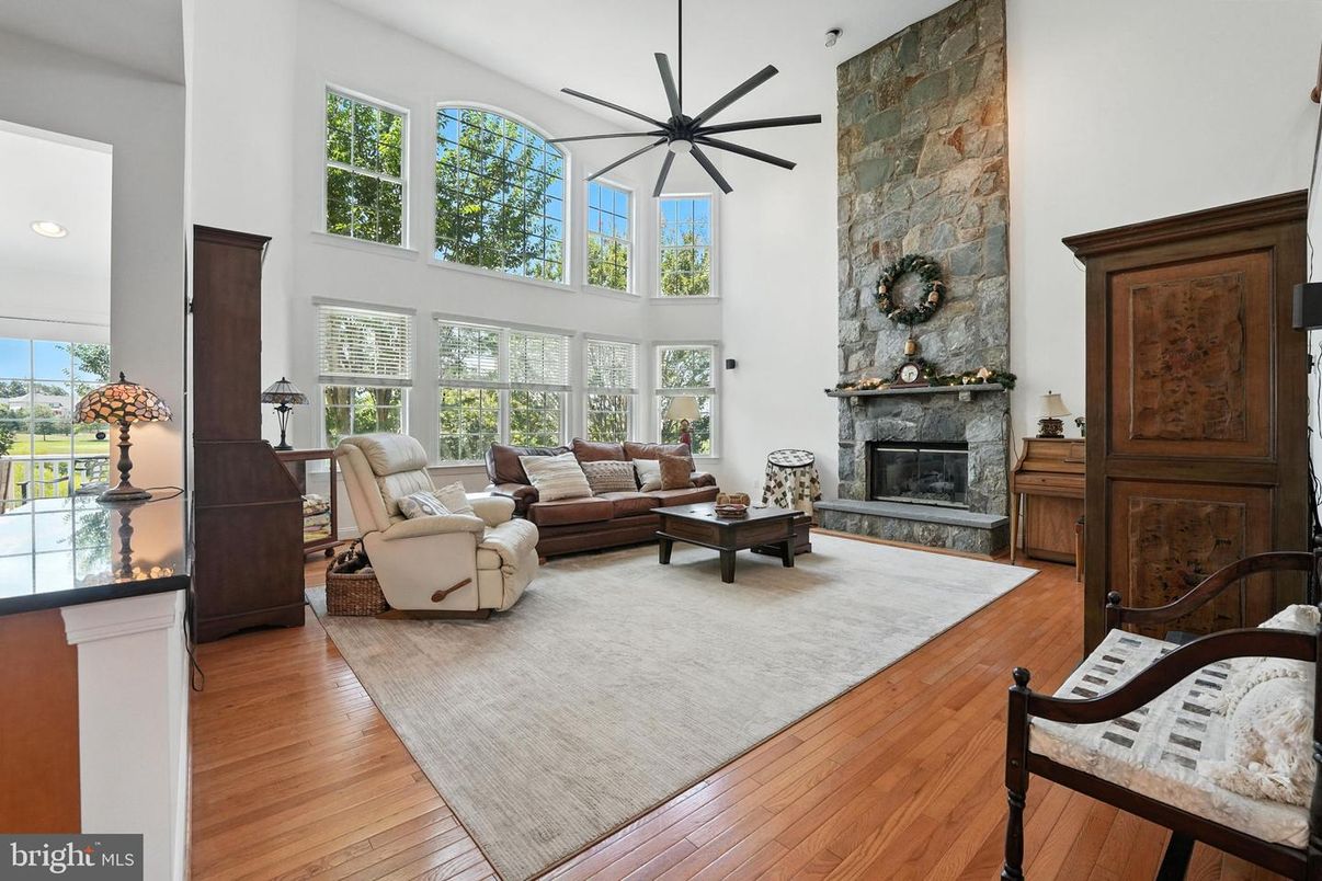 Fireplace, Interior, Living room, Pendant Lights, Recessed Lighting, Stone Walls, Wood Texture Flooring