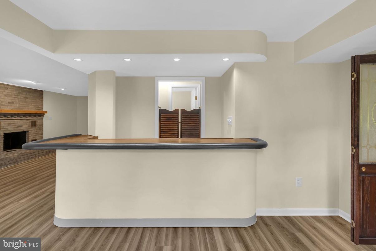 Fireplace, Interior, Recessed Lighting, Stone Walls, Wood Texture Flooring