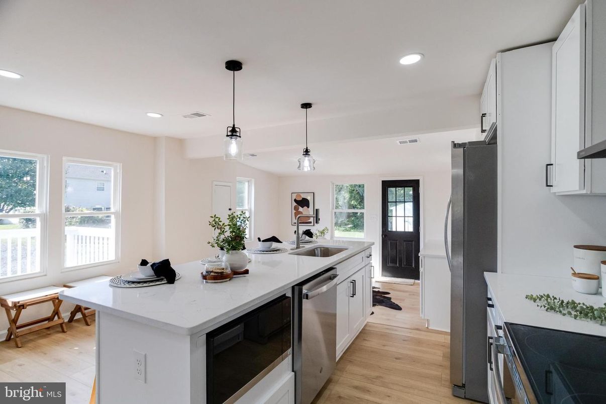 Interior, Kitchen, Pendant Lights, Recessed Lighting, Stainless Steel Appliances, Wood Texture Flooring