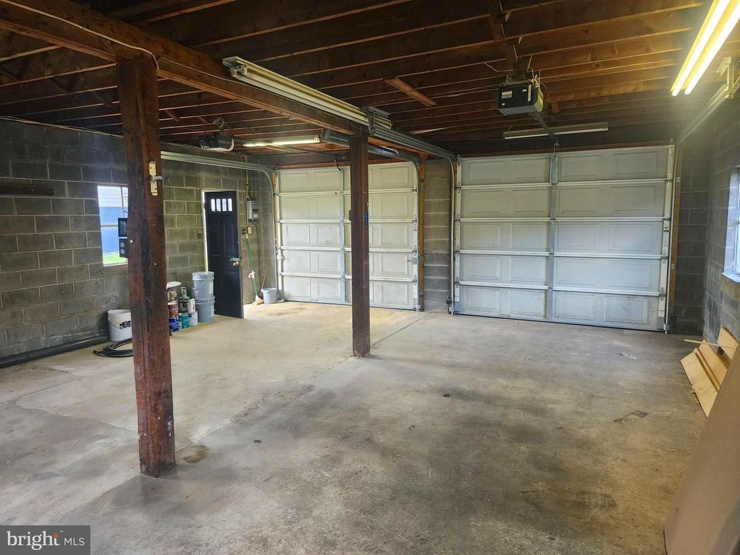 Garage, Interior, Stone Walls, Wooden Beams