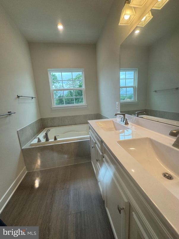 Bathroom, Dual Sink Vanities, Interior, Recessed Lighting, Wood Texture Flooring