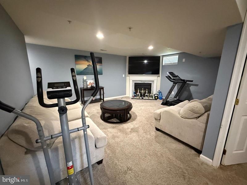 Fireplace, Fitness Equipment, Interior, Living room, Recessed Lighting