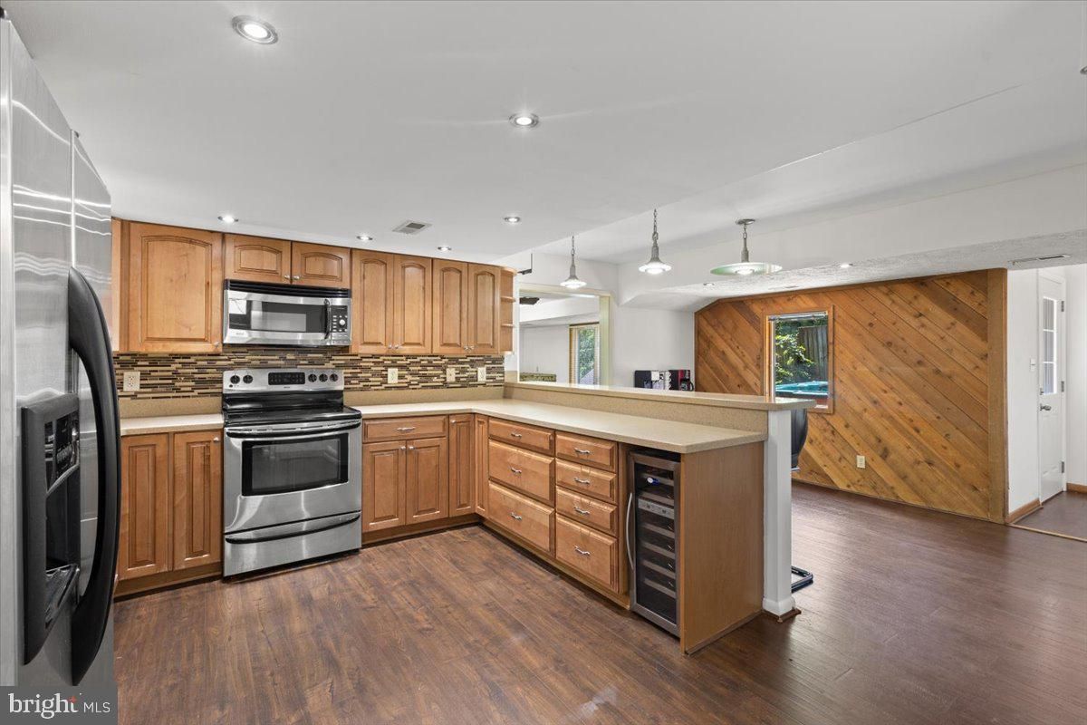Interior, Kitchen, Pendant Lights, Recessed Lighting, Stainless Steel Appliances, Wood Texture Flooring, Wooden Walls