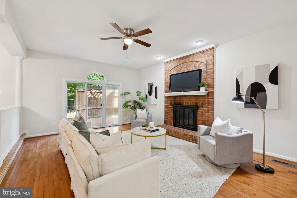 Fireplace, Interior, Living room, Recessed Lighting, Stone Walls, Wood Texture Flooring