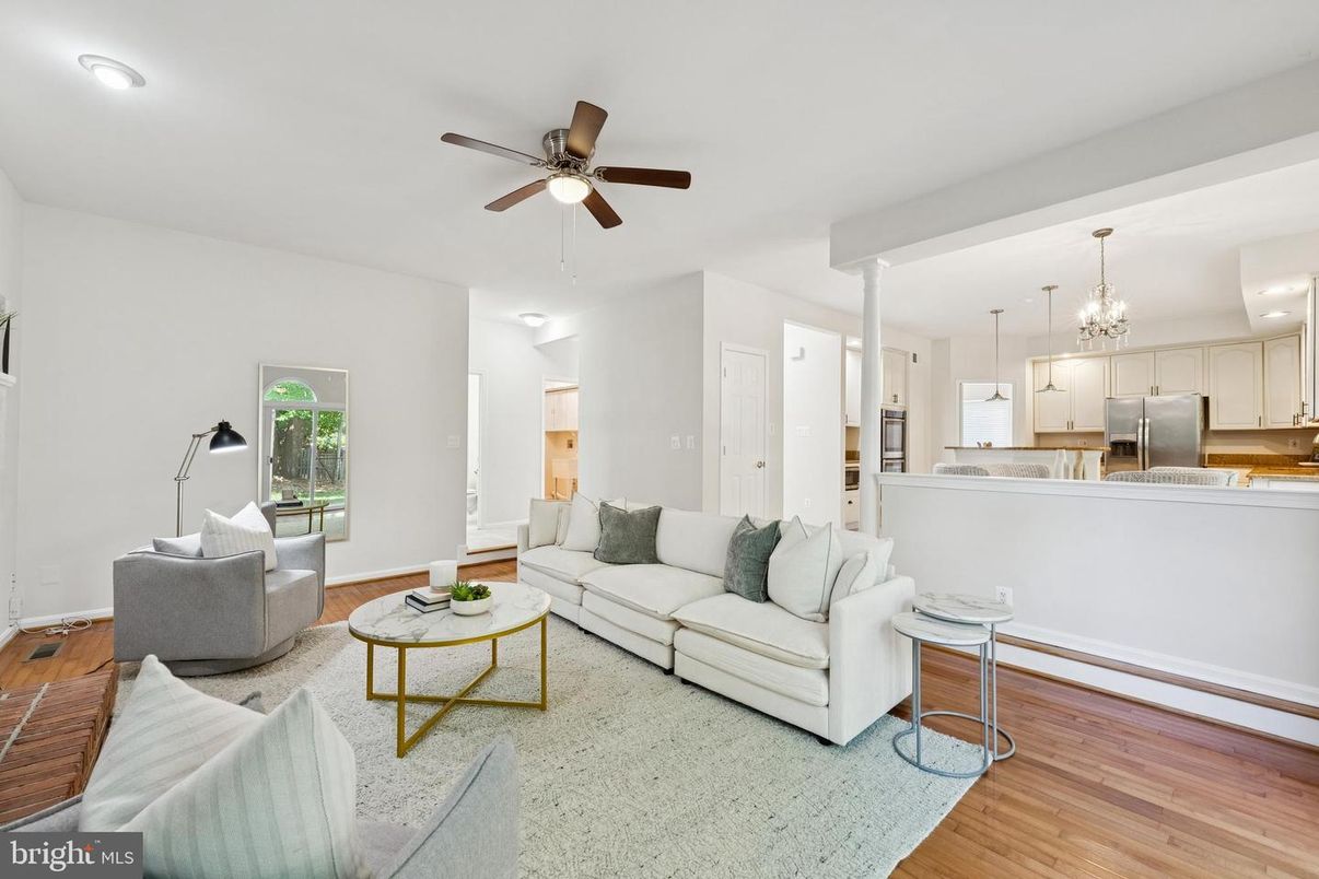Chandelier, Interior, Kitchen, Living room, Pendant Lights, Recessed Lighting, Stainless Steel Appliances, Wood Texture Flooring
