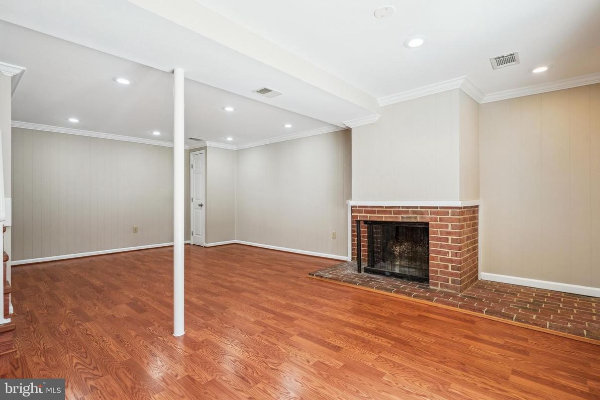 Empty room, Fireplace, Interior, Recessed Lighting, Wood Texture Flooring