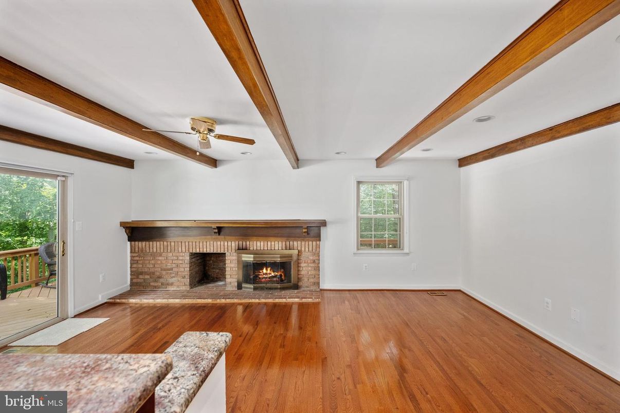 Empty room, Fireplace, Interior, Recessed Lighting, Wooden Beams, Wood Texture Flooring