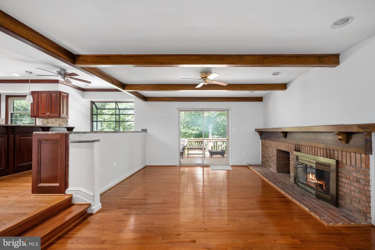Empty room, Fireplace, Interior, Recessed Lighting, Wooden Beams, Wood Texture Flooring