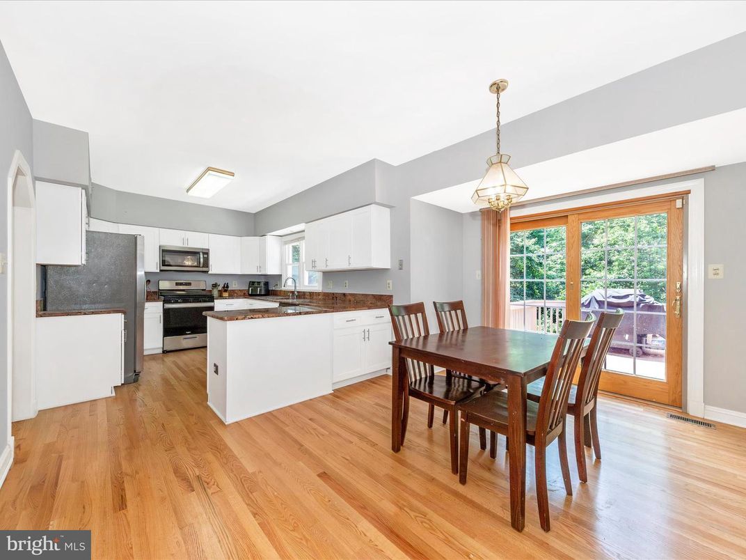 Dining room, Interior, Kitchen, Pendant Lights, Stainless Steel Appliances, Wood Texture Flooring