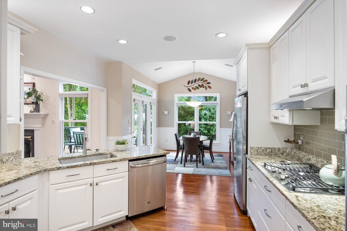 Dining room, Fireplace, Interior, Kitchen, Pendant Lights, Recessed Lighting, Wood Texture Flooring
