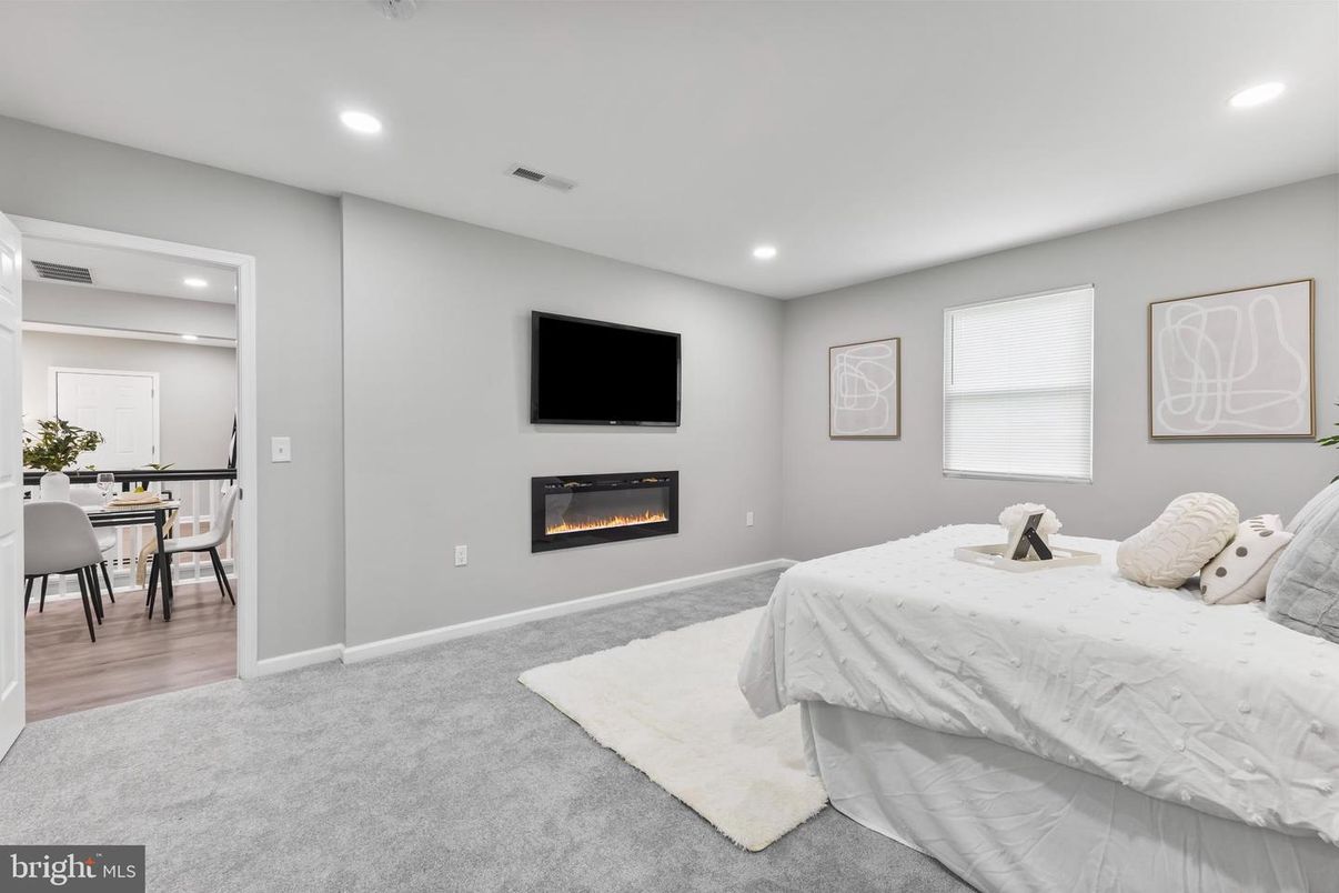 Bedroom, Dining room, Fireplace, Interior, Recessed Lighting, Wood Texture Flooring