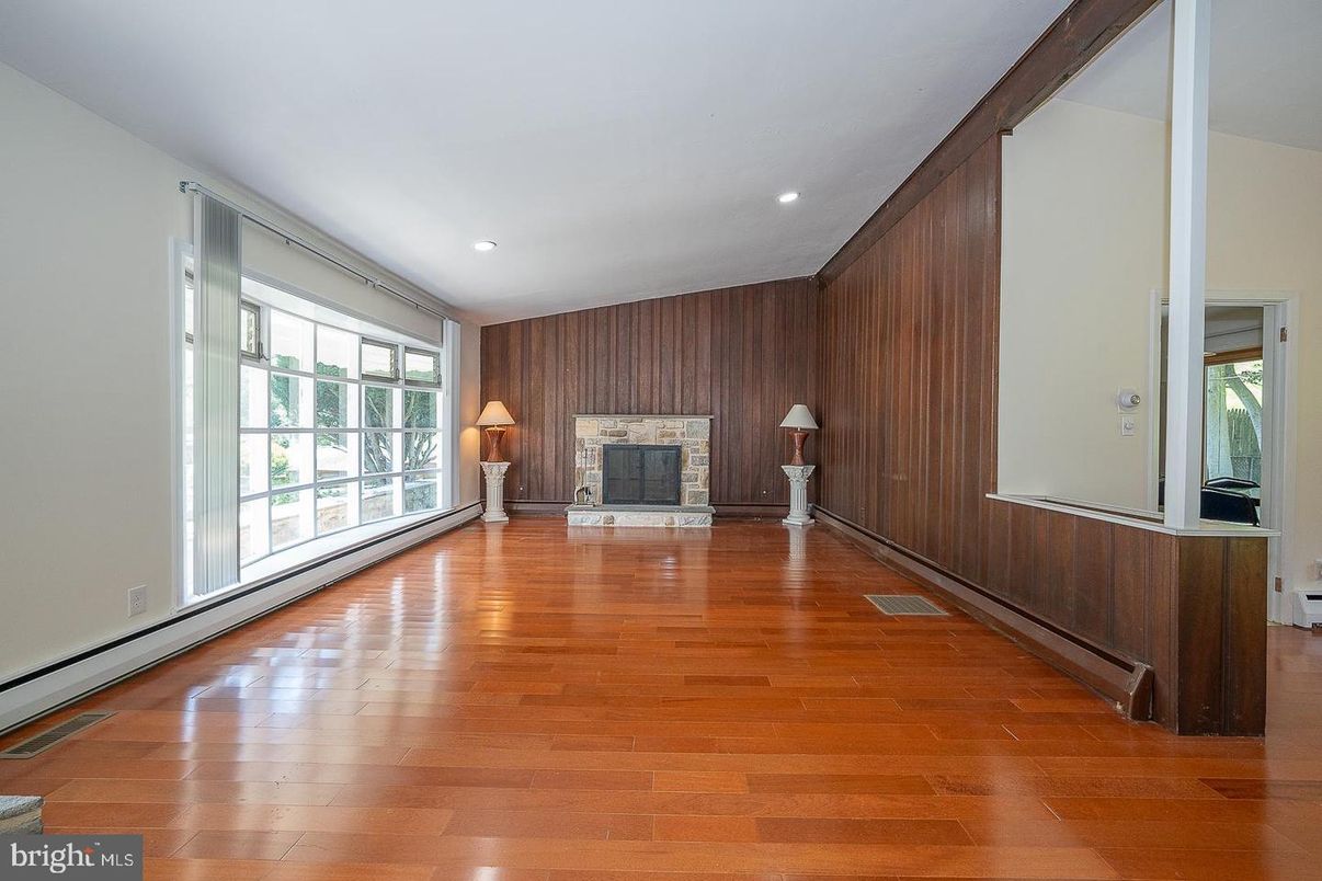 Empty room, Fireplace, Interior, Recessed Lighting, Wood Texture Flooring, Wooden Walls