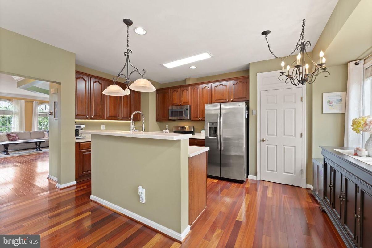 Chandelier, Interior, Kitchen, Pendant Lights, Recessed Lighting, Stainless Steel Appliances, Wood Texture Flooring