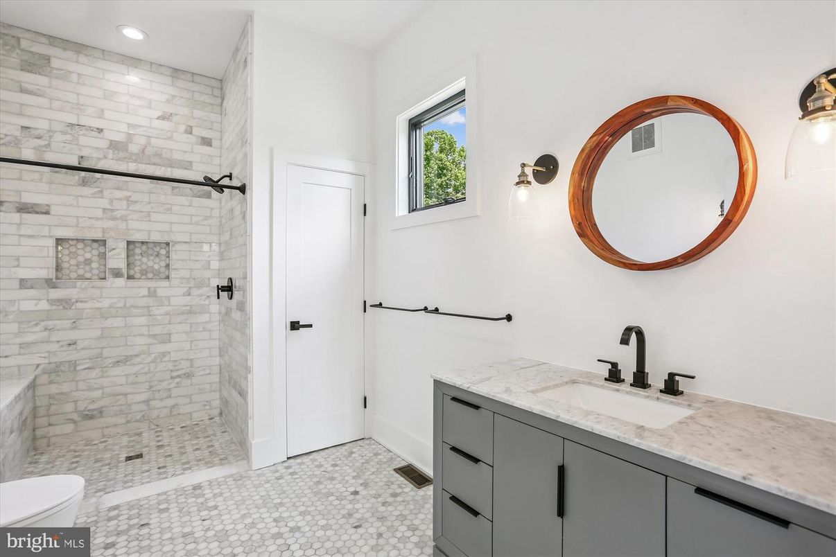 Bathroom, Dual Sink Vanities, Glass Shower, Interior, Recessed Lighting, Stone Walls