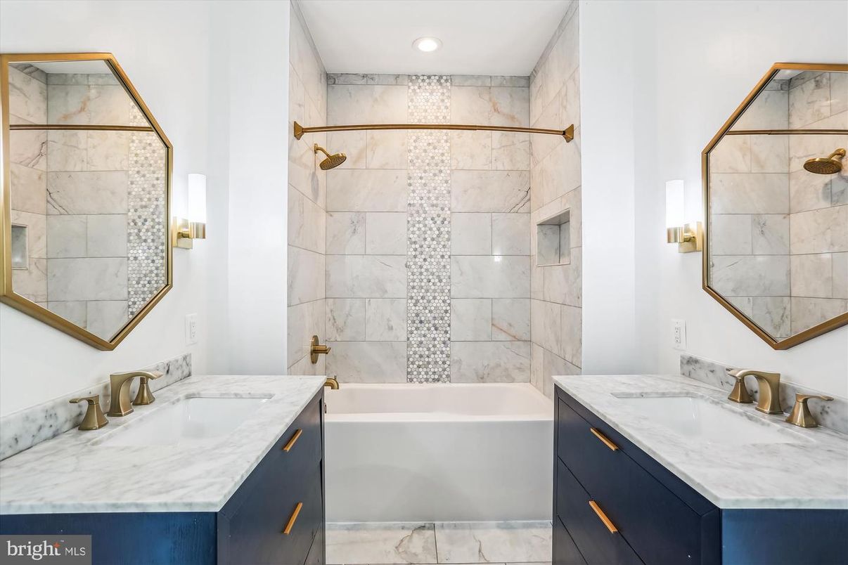 Bathroom, Dual Sink Vanities, Interior, Marble, Marble Walls, Recessed Lighting