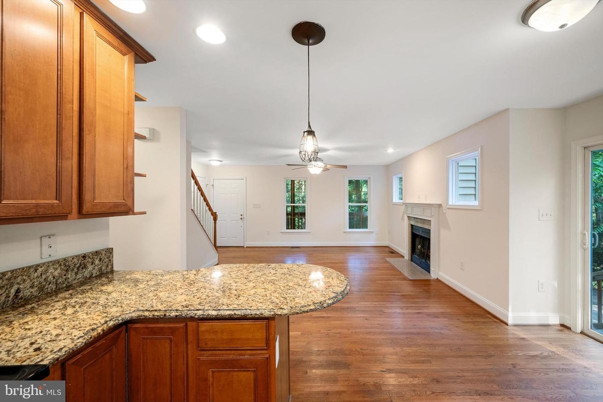 Fireplace, Interior, Pendant Lights, Recessed Lighting, Wood Texture Flooring
