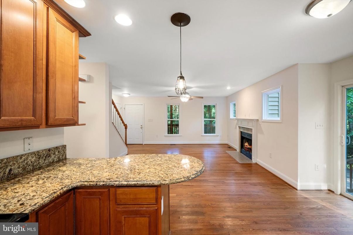 Fireplace, Interior, Pendant Lights, Recessed Lighting, Wood Texture Flooring