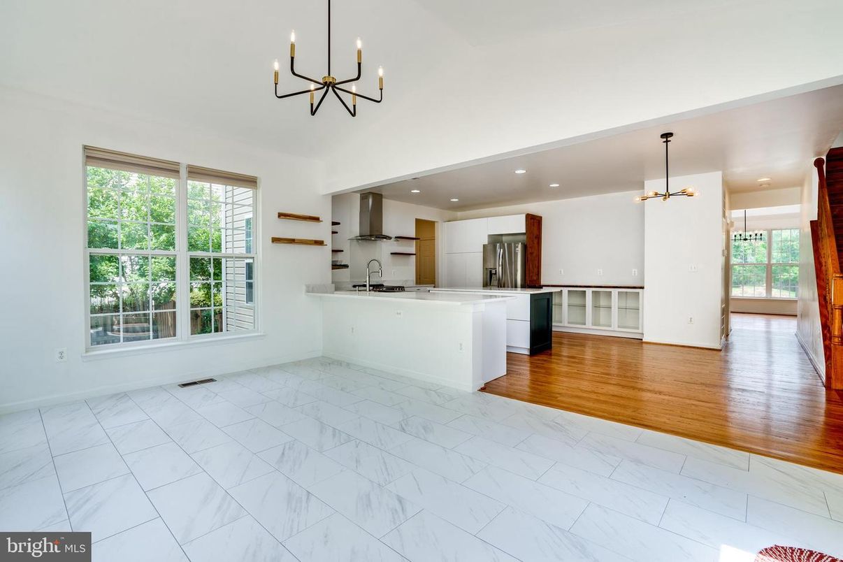Chandelier, Interior, Kitchen, Marble, Pendant Lights, Recessed Lighting, Stainless Steel Appliances, Wood Texture Flooring
