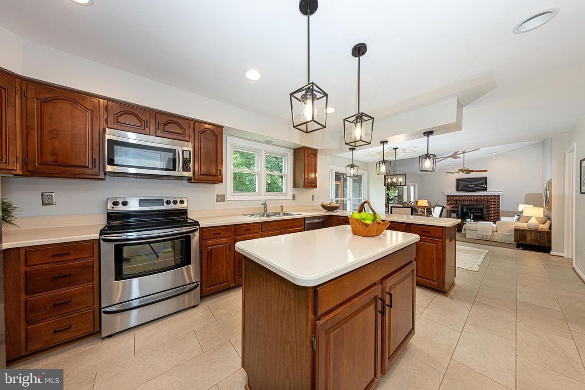 Fireplace, Interior, Kitchen, Living room, Pendant Lights, Recessed Lighting, Stainless Steel Appliances