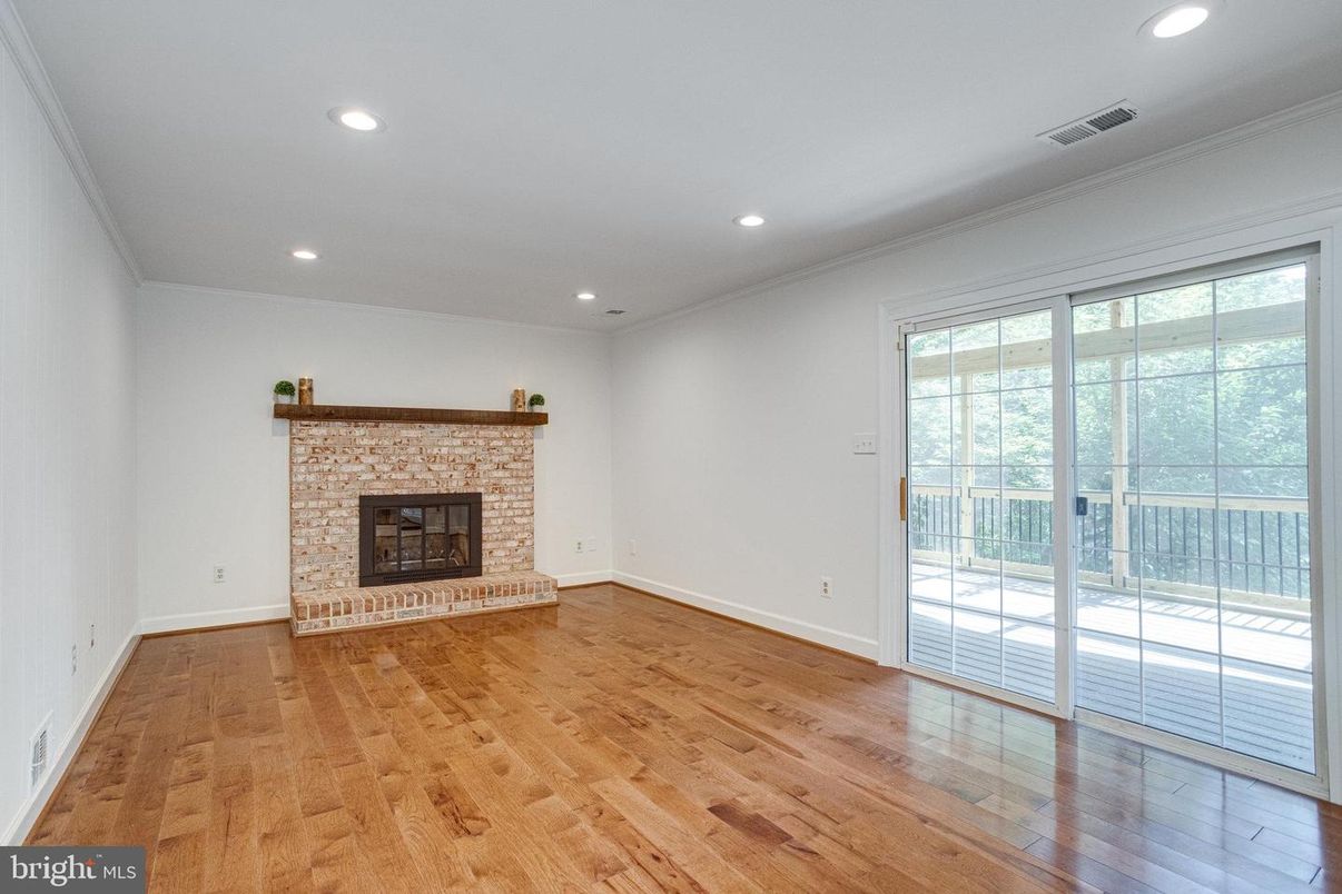 Empty room, Fireplace, Interior, Recessed Lighting, Wood Texture Flooring