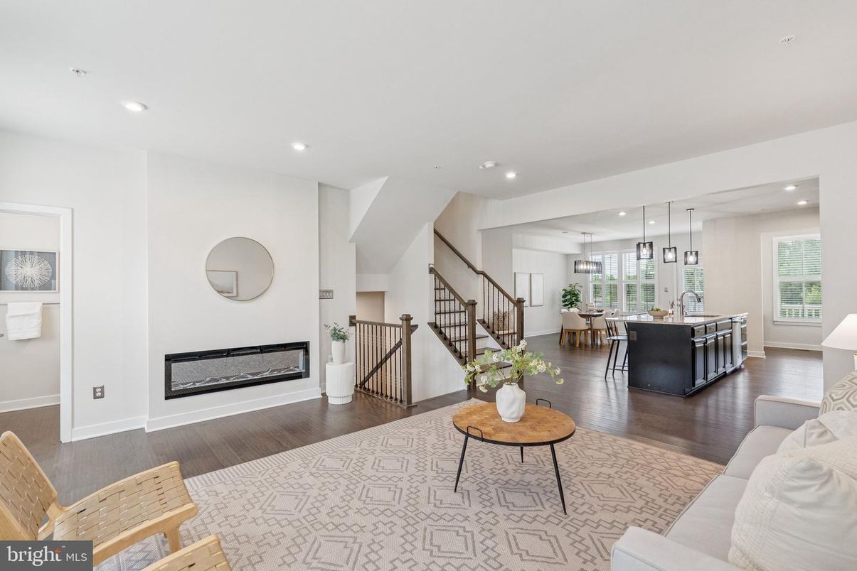 Dining room, Fireplace, Interior, Living room, Pendant Lights, Recessed Lighting, Wood Texture Flooring