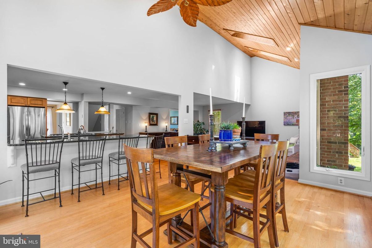 Dining room, Interior, Kitchen, Pendant Lights, Recessed Lighting, Stainless Steel Appliances, Wooden Ceilings, Wood Texture Flooring