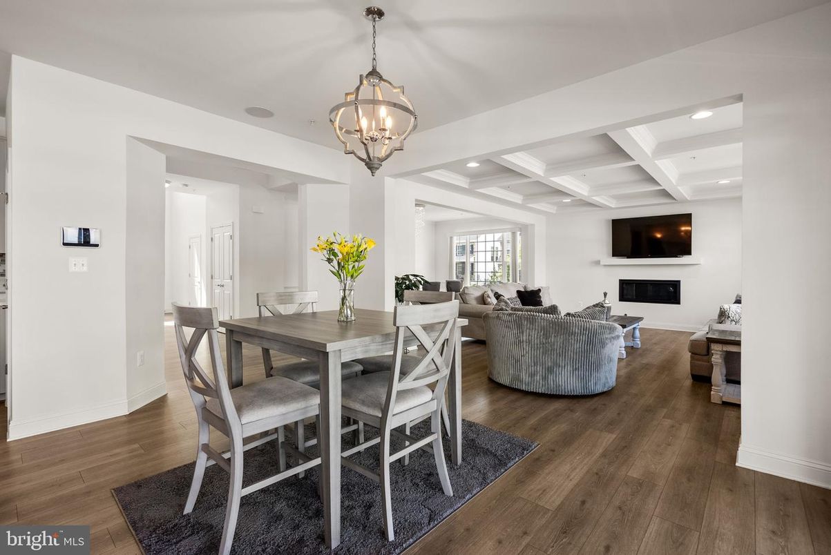 Chandelier, Dining room, Fireplace, Interior, Living room, Recessed Lighting, Wood Texture Flooring