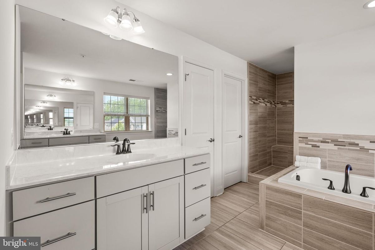 Bathroom, Dual Sink Vanities, Interior, Recessed Lighting, Wood Texture Flooring
