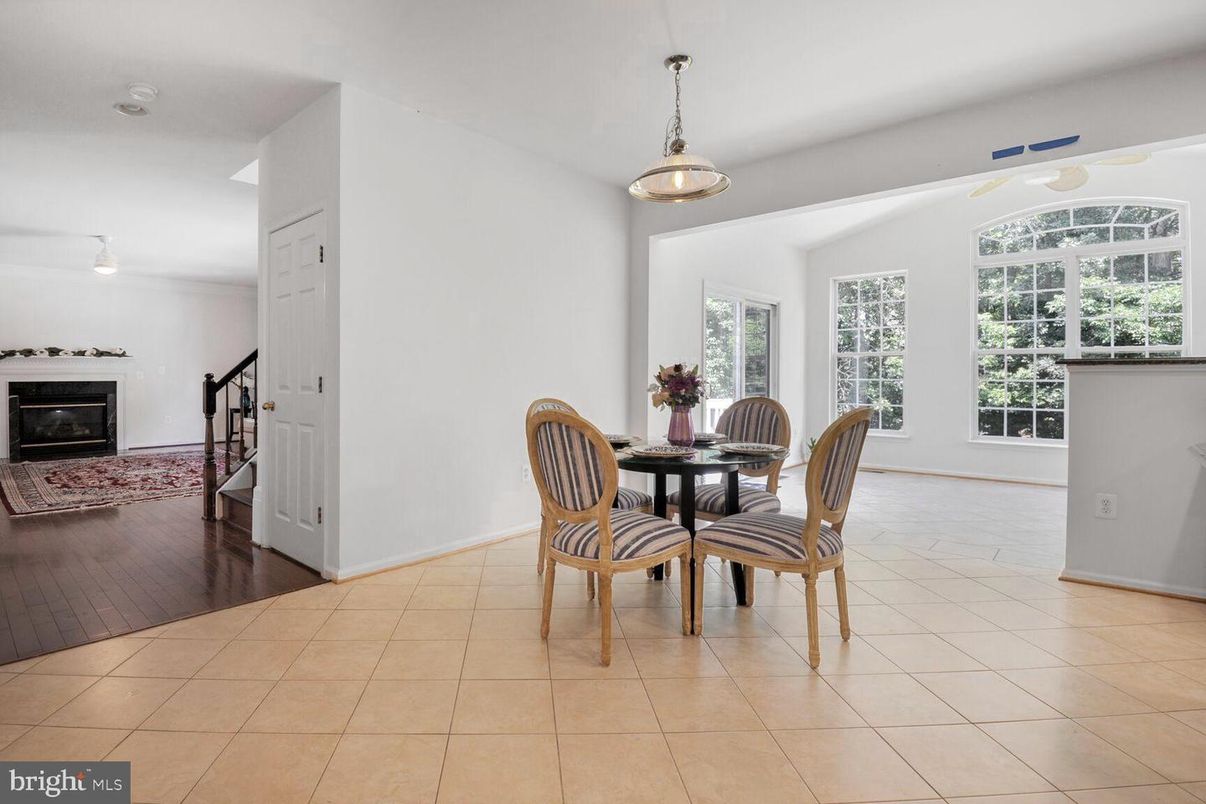 Dining room, Fireplace, Interior, Pendant Lights, Wood Texture Flooring