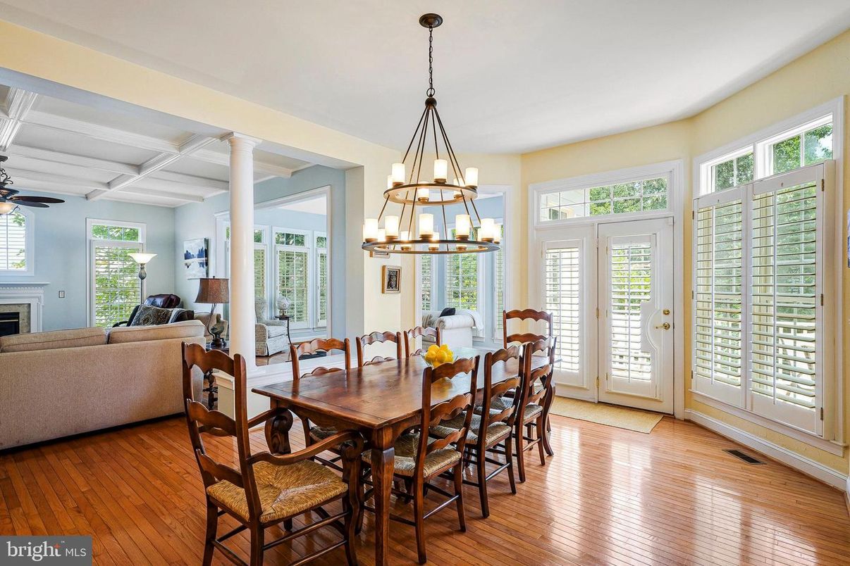 Chandelier, Dining room, Fireplace, Interior, Living room, Pendant Lights, Wood Texture Flooring
