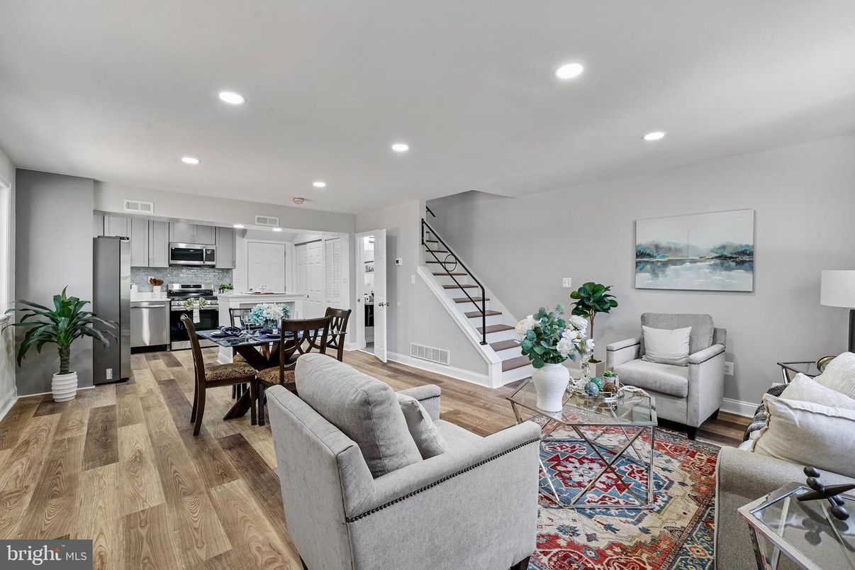 Dining room, Interior, Kitchen, Living room, Recessed Lighting, Stainless Steel Appliances, Wood Texture Flooring