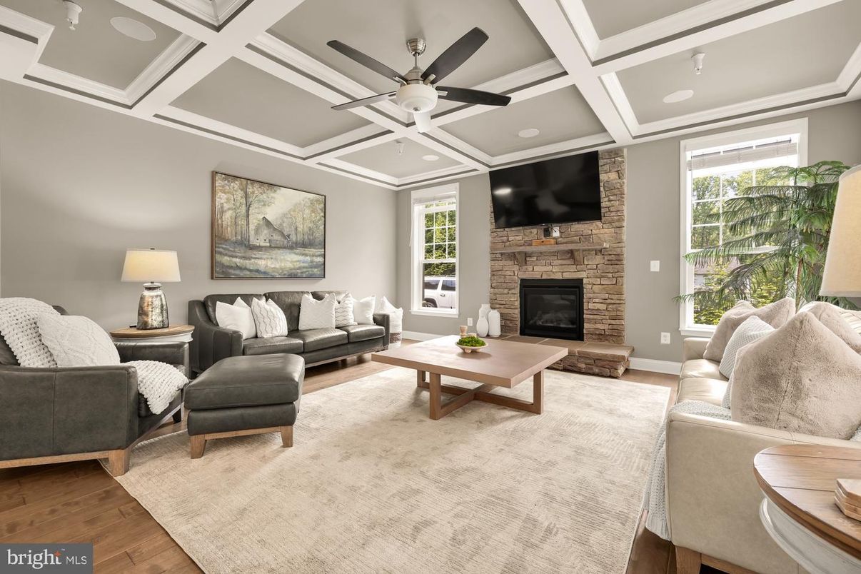 Fireplace, Interior, Living room, Recessed Lighting, Stone Walls, Wood Texture Flooring