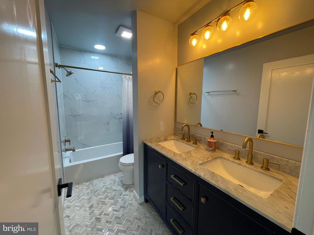 Bathroom, Dual Sink Vanities, Interior, Marble Walls, Recessed Lighting