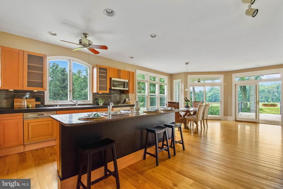 Dining room, Interior, Kitchen, Recessed Lighting, Stainless Steel Appliances, Wood Texture Flooring