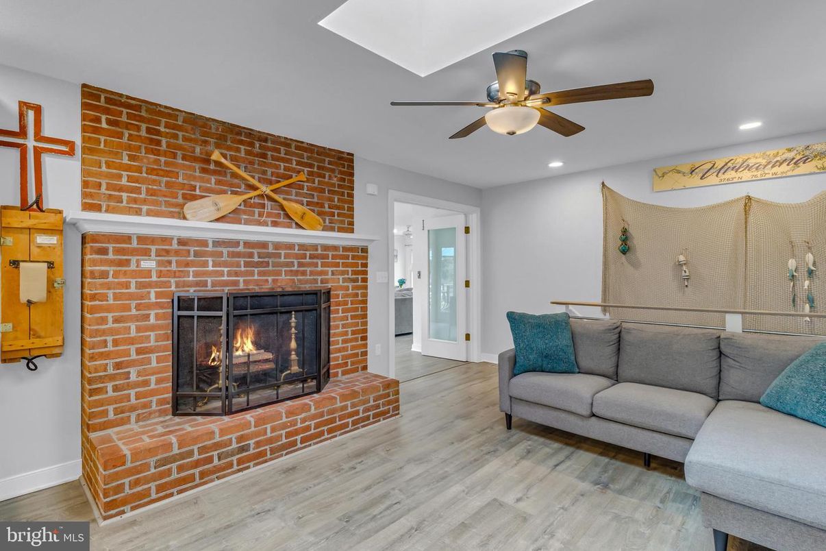 Fireplace, Interior, Recessed Lighting, Stone Walls, Wood Texture Flooring