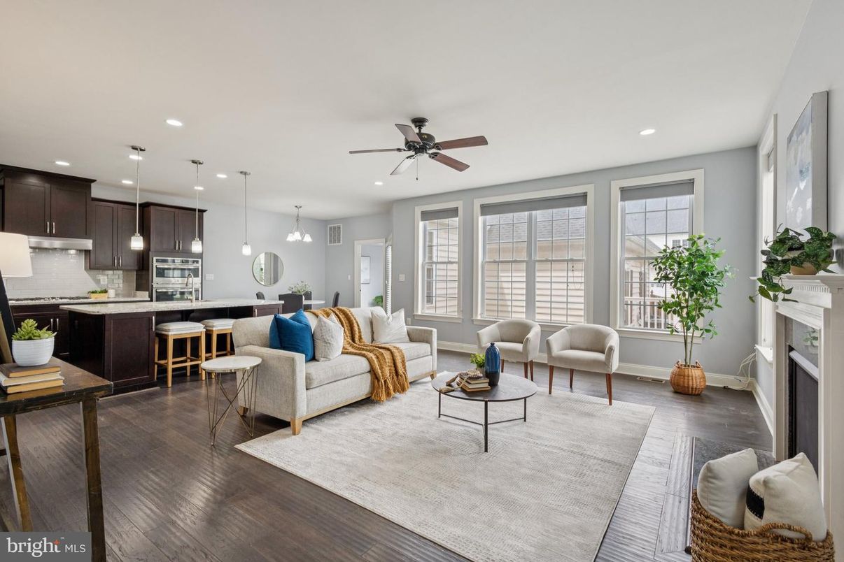 Fireplace, Interior, Kitchen, Living room, Pendant Lights, Recessed Lighting, Stainless Steel Appliances, Wood Texture Flooring