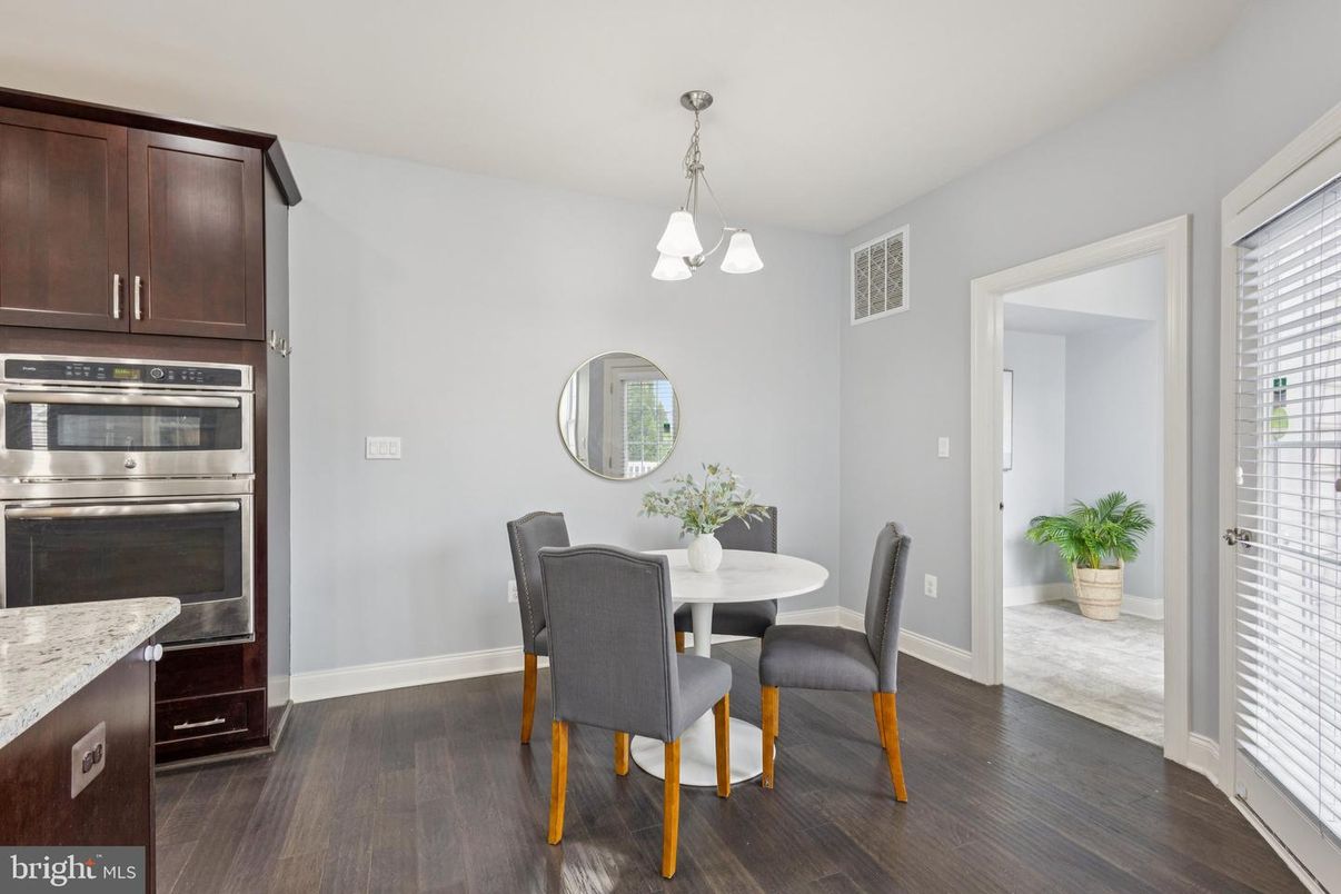 Dining room, Interior, Kitchen, Pendant Lights, Stainless Steel Appliances, Wood Texture Flooring