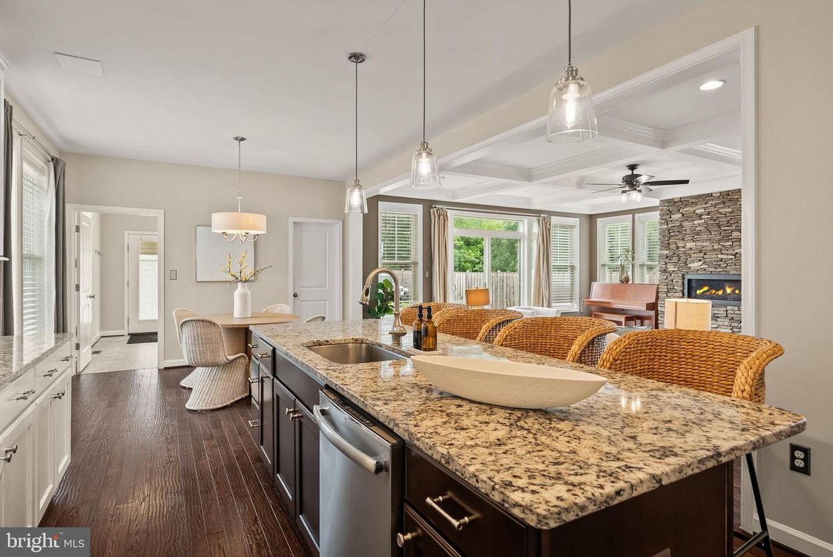 Fireplace, Interior, Kitchen, Pendant Lights, Recessed Lighting, Stone Walls, Wood Texture Flooring