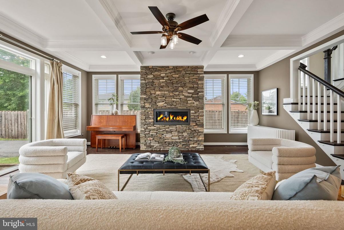 Fireplace, Interior, Living room, Piano, Recessed Lighting, Stone Walls, Wood Texture Flooring